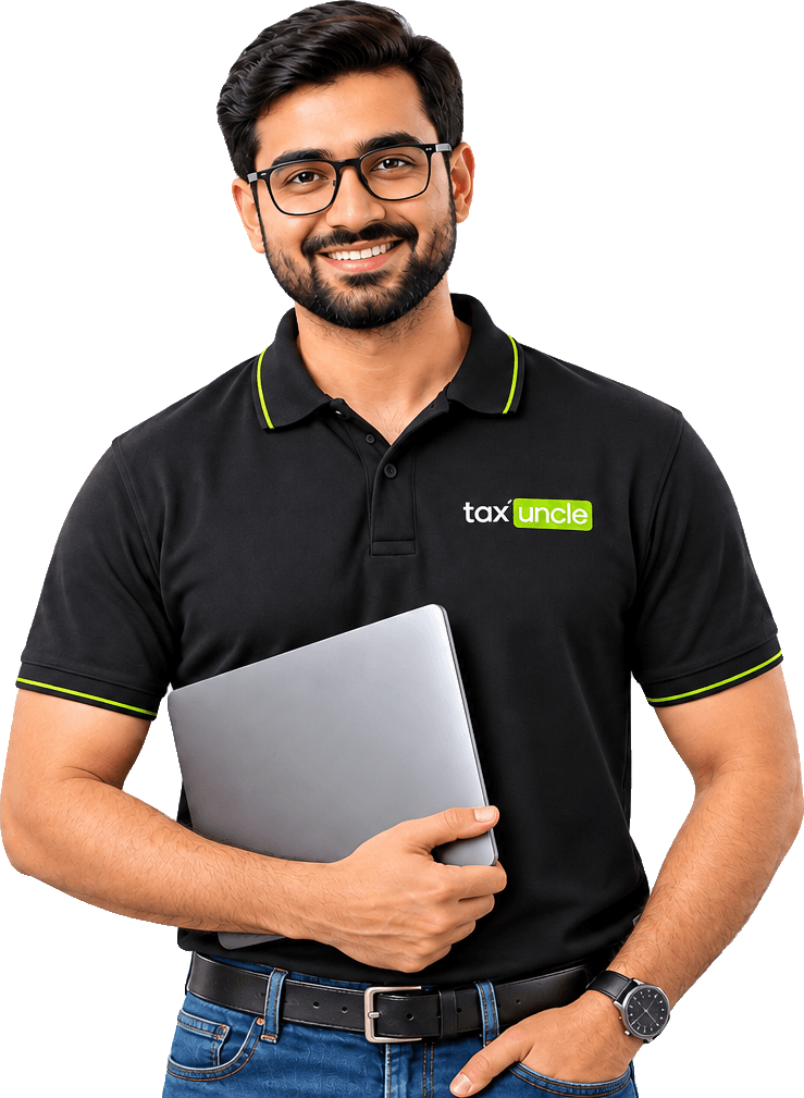 Smiling Tax Uncle tax professional in a branded polo, holding a laptop